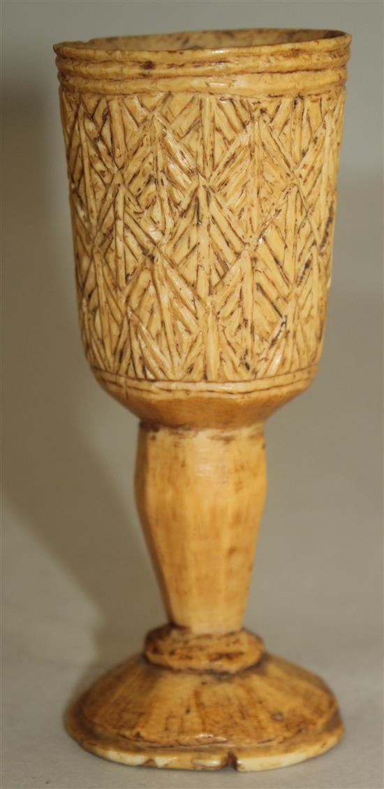 A 19th century or earlier African ivory goblet, 4.25in.